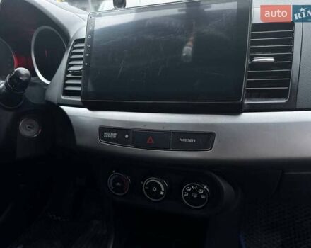 Серый Мицубиси Лансер, объемом двигателя 1.5 л и пробегом 147 тыс. км за 6700 $, фото 17 на Automoto.ua