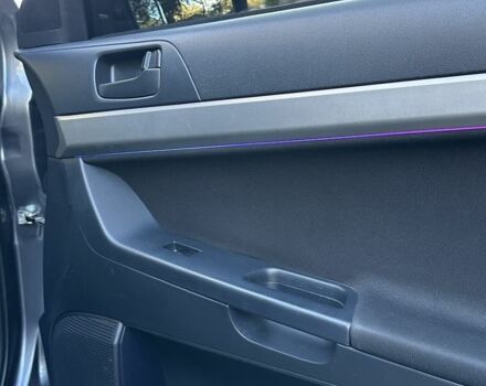 Серый Мицубиси Лансер, объемом двигателя 2 л и пробегом 153 тыс. км за 7500 $, фото 6 на Automoto.ua