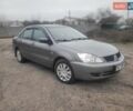Сірий Міцубісі Lancer, об'ємом двигуна 1.6 л та пробігом 440 тис. км за 4200 $, фото 1 на Automoto.ua