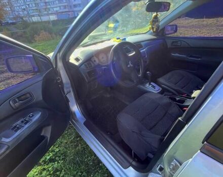 Сірий Міцубісі Lancer, об'ємом двигуна 1.6 л та пробігом 364 тис. км за 4300 $, фото 5 на Automoto.ua