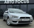 Сірий Міцубісі Lancer, об'ємом двигуна 1.5 л та пробігом 233 тис. км за 5890 $, фото 1 на Automoto.ua