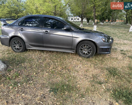Серый Мицубиси Лансер, объемом двигателя 1.5 л и пробегом 255 тыс. км за 6000 $, фото 7 на Automoto.ua