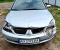 Сірий Міцубісі Lancer, об'ємом двигуна 1.6 л та пробігом 199 тис. км за 1250 $, фото 1 на Automoto.ua