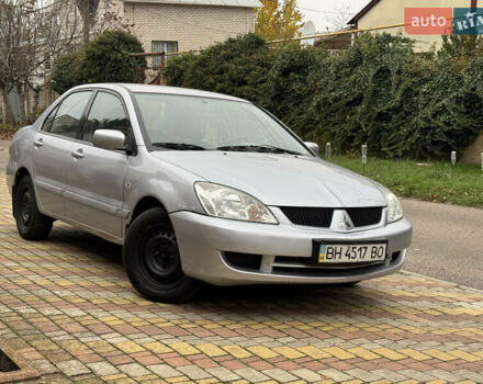 Сірий Міцубісі Lancer, об'ємом двигуна 1.6 л та пробігом 221 тис. км за 3650 $, фото 12 на Automoto.ua