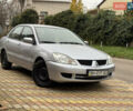 Сірий Міцубісі Lancer, об'ємом двигуна 1.6 л та пробігом 221 тис. км за 3650 $, фото 12 на Automoto.ua