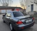 Серый Мицубиси Лансер, объемом двигателя 1.6 л и пробегом 225 тыс. км за 3350 $, фото 5 на Automoto.ua