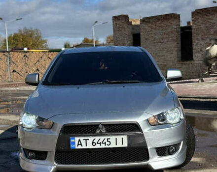 Серый Мицубиси Лансер, объемом двигателя 2 л и пробегом 190 тыс. км за 6900 $, фото 5 на Automoto.ua