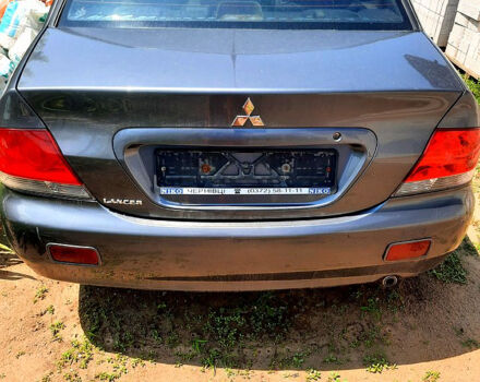 Сірий Міцубісі Lancer, об'ємом двигуна 1.6 л та пробігом 200 тис. км за 2000 $, фото 1 на Automoto.ua