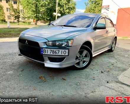 Серый Мицубиси Лансер, объемом двигателя 2 л и пробегом 175 тыс. км за 6800 $, фото 6 на Automoto.ua