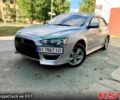 Серый Мицубиси Лансер, объемом двигателя 2 л и пробегом 175 тыс. км за 6800 $, фото 6 на Automoto.ua