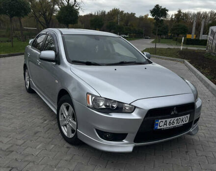 Серый Мицубиси Лансер, объемом двигателя 2 л и пробегом 211 тыс. км за 7100 $, фото 4 на Automoto.ua