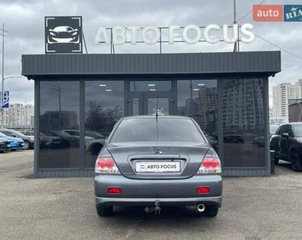 Серый Мицубиси Лансер, объемом двигателя 1.58 л и пробегом 146 тыс. км за 5490 $, фото 6 на Automoto.ua