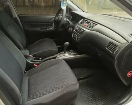 Сірий Міцубісі Lancer, об'ємом двигуна 1.6 л та пробігом 176 тис. км за 4999 $, фото 25 на Automoto.ua