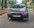 Сірий Міцубісі Lancer, об'ємом двигуна 2 л та пробігом 205 тис. км за 5699 $, фото 1 на Automoto.ua