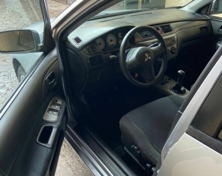 Сірий Міцубісі Lancer, об'ємом двигуна 1.6 л та пробігом 196 тис. км за 4700 $, фото 7 на Automoto.ua