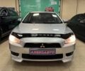 Серый Мицубиси Лансер, объемом двигателя 1.5 л и пробегом 241 тыс. км за 6400 $, фото 6 на Automoto.ua