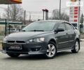 Сірий Міцубісі Lancer, об'ємом двигуна 1.5 л та пробігом 235 тис. км за 6399 $, фото 1 на Automoto.ua