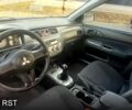 Сірий Міцубісі Lancer, об'ємом двигуна 1.6 л та пробігом 164 тис. км за 4950 $, фото 12 на Automoto.ua