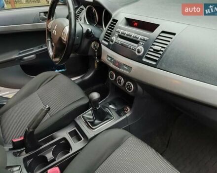 Серый Мицубиси Лансер, объемом двигателя 2 л и пробегом 234 тыс. км за 7200 $, фото 16 на Automoto.ua