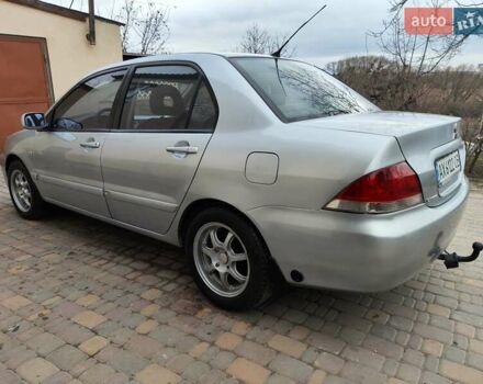 Серый Мицубиси Лансер, объемом двигателя 1.58 л и пробегом 185 тыс. км за 4700 $, фото 17 на Automoto.ua