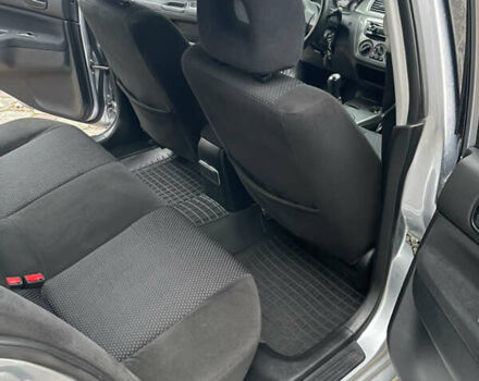 Сірий Міцубісі Lancer, об'ємом двигуна 1.59 л та пробігом 219 тис. км за 4500 $, фото 16 на Automoto.ua
