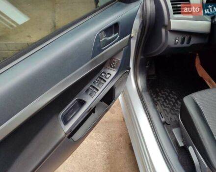 Серый Мицубиси Лансер, объемом двигателя 2 л и пробегом 234 тыс. км за 7200 $, фото 19 на Automoto.ua