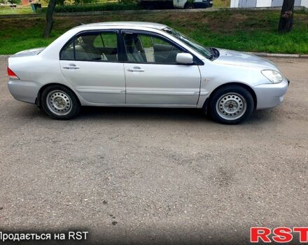 Серый Мицубиси Лансер, объемом двигателя 1.6 л и пробегом 98 тыс. км за 6200 $, фото 1 на Automoto.ua