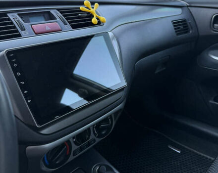 Сірий Міцубісі Lancer, об'ємом двигуна 1.58 л та пробігом 113 тис. км за 6700 $, фото 10 на Automoto.ua