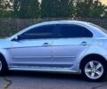 Сірий Міцубісі Lancer, об'ємом двигуна 1.5 л та пробігом 166 тис. км за 7000 $, фото 1 на Automoto.ua