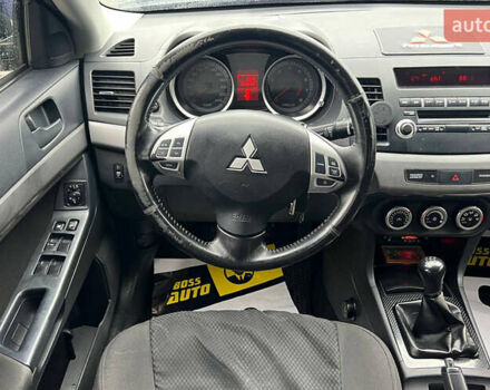 Серый Мицубиси Лансер, объемом двигателя 1.5 л и пробегом 239 тыс. км за 6000 $, фото 6 на Automoto.ua