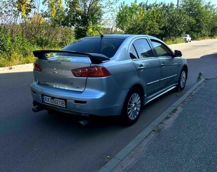 Серый Мицубиси Лансер, объемом двигателя 2 л и пробегом 240 тыс. км за 6500 $, фото 4 на Automoto.ua