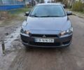 Сірий Міцубісі Lancer, об'ємом двигуна 1.5 л та пробігом 263 тис. км за 5200 $, фото 1 на Automoto.ua