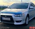 Серый Мицубиси Лансер, объемом двигателя 1.5 л и пробегом 166 тыс. км за 7000 $, фото 1 на Automoto.ua