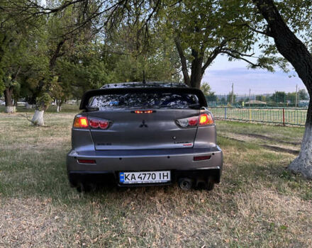 Серый Мицубиси Лансер, объемом двигателя 1.5 л и пробегом 255 тыс. км за 6000 $, фото 5 на Automoto.ua