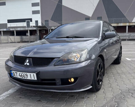 Серый Мицубиси Лансер, объемом двигателя 1.58 л и пробегом 250 тыс. км за 4300 $, фото 9 на Automoto.ua