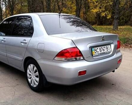 Серый Мицубиси Лансер, объемом двигателя 1.58 л и пробегом 176 тыс. км за 5000 $, фото 10 на Automoto.ua