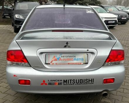Серый Мицубиси Лансер, объемом двигателя 1.6 л и пробегом 205 тыс. км за 5400 $, фото 5 на Automoto.ua