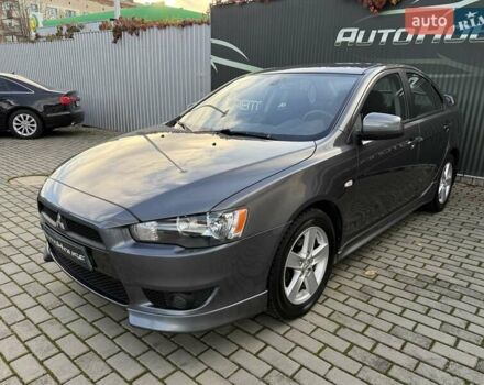 Серый Мицубиси Лансер, объемом двигателя 2 л и пробегом 230 тыс. км за 6900 $, фото 11 на Automoto.ua