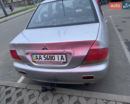 Серый Мицубиси Лансер, объемом двигателя 1.58 л и пробегом 330 тыс. км за 3500 $, фото 19 на Automoto.ua