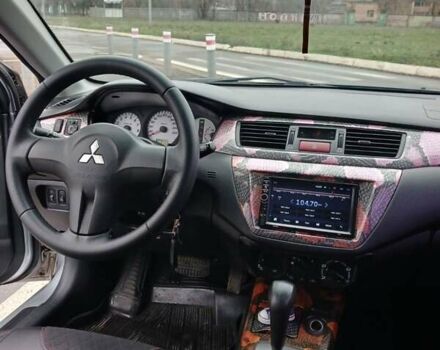 Сірий Міцубісі Lancer, об'ємом двигуна 1.6 л та пробігом 225 тис. км за 5200 $, фото 11 на Automoto.ua
