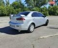 Серый Мицубиси Лансер, объемом двигателя 1.5 л и пробегом 215 тыс. км за 5700 $, фото 1 на Automoto.ua