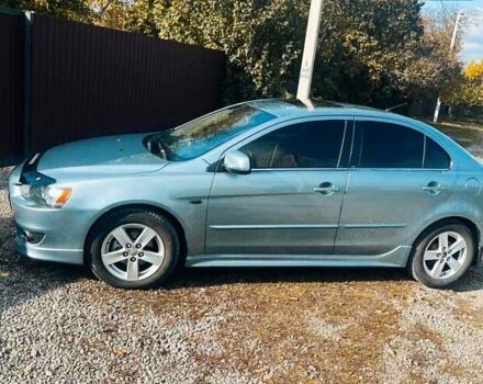 Сірий Міцубісі Lancer, об'ємом двигуна 2 л та пробігом 212 тис. км за 7300 $, фото 8 на Automoto.ua