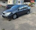 Сірий Міцубісі Lancer, об'ємом двигуна 1.58 л та пробігом 457 тис. км за 2300 $, фото 1 на Automoto.ua