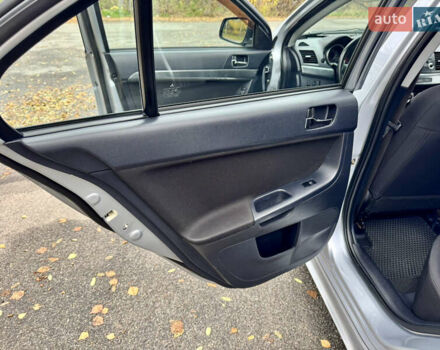 Сірий Міцубісі Lancer, об'ємом двигуна 2 л та пробігом 225 тис. км за 6890 $, фото 12 на Automoto.ua