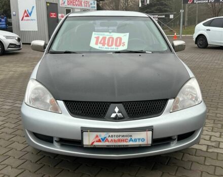 Серый Мицубиси Лансер, объемом двигателя 1.6 л и пробегом 205 тыс. км за 5400 $, фото 1 на Automoto.ua