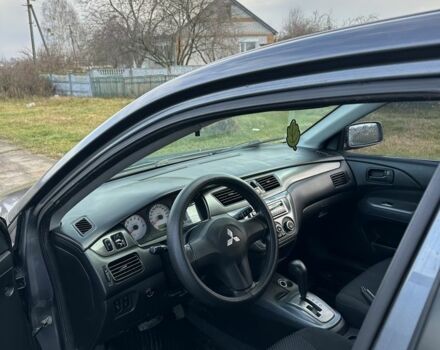 Серый Мицубиси Лансер, объемом двигателя 1.6 л и пробегом 114 тыс. км за 4000 $, фото 6 на Automoto.ua