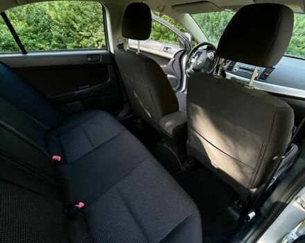 Серый Мицубиси Лансер, объемом двигателя 2 л и пробегом 112 тыс. км за 7900 $, фото 19 на Automoto.ua