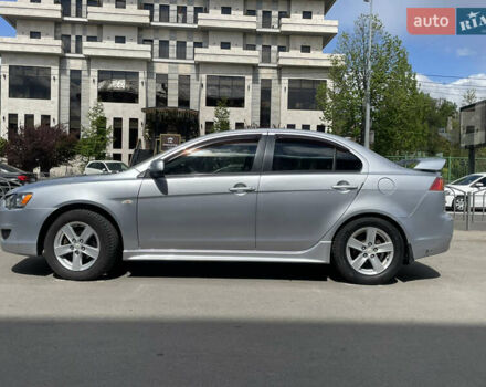 Серый Мицубиси Лансер, объемом двигателя 2 л и пробегом 265 тыс. км за 5500 $, фото 11 на Automoto.ua