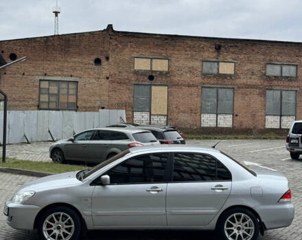 Сірий Міцубісі Lancer, об'ємом двигуна 1.6 л та пробігом 269 тис. км за 3999 $, фото 7 на Automoto.ua