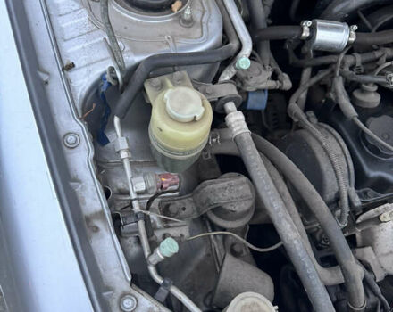 Серый Мицубиси Лансер, объемом двигателя 1.58 л и пробегом 330 тыс. км за 3500 $, фото 4 на Automoto.ua